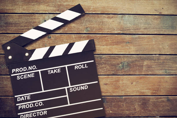 istock Clapper board,Movie clapper on wooden backgrond 690130460