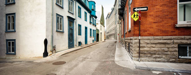 istock Empty street intersection going uphill in old Quebec City panorama 690131342