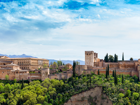 View of the grounds of the Alhambra of Granada, from where you can enjoy a beautiful view of the city. The palace is the most famous landmark of Granada and a monument of the Islamic architecture in the world.