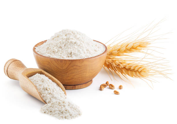 whole grain wheat flour and ears isolated on white - whole wheat imagens e fotografias de stock