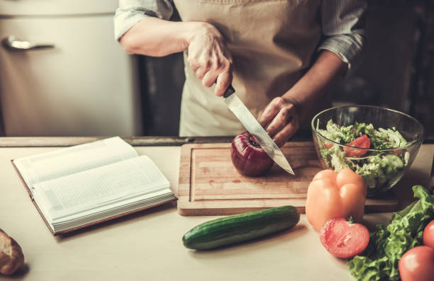 istock Mature woman in kitchen 690134580