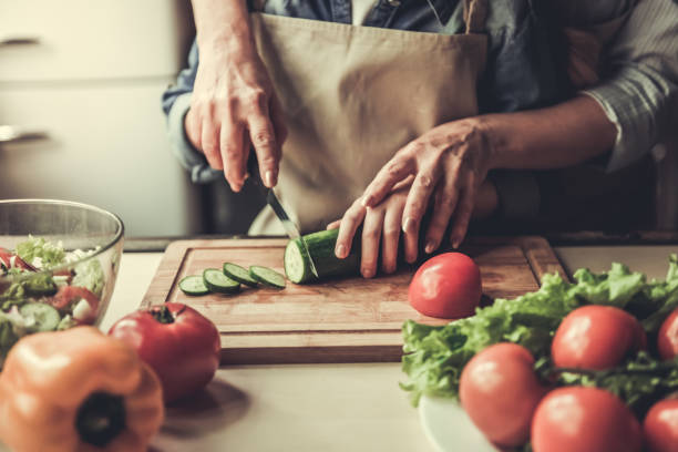 istock Grandma and granddaughter in kitchen 690134712