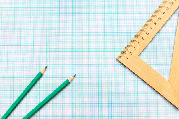 istock Pencils with ruller on the graph paper. Top View. 690145050
