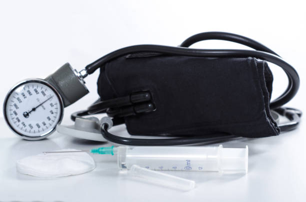 istock disposable syringe and a black stethoscope 690146638
