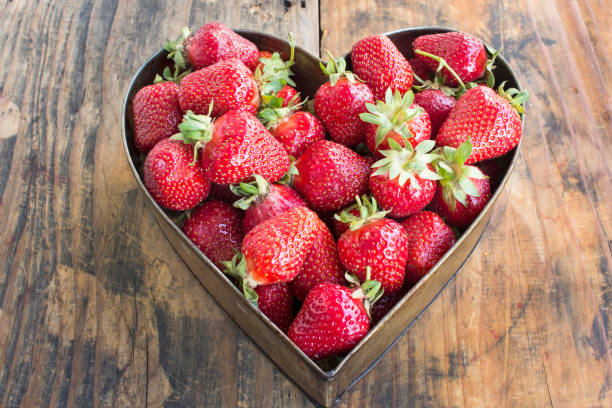 istock Strawberries in Heart Pan 690152542