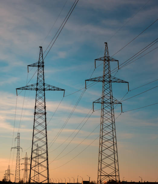 istock high-voltage power lines at sunset. electricity distribution station. high voltage electric transmission tower. 690153092