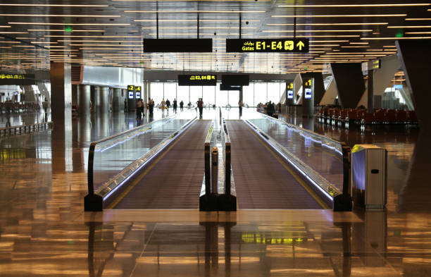 istock Moving walkway at the airport 690153736