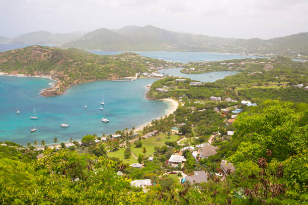istock Antigua, English Harbour panoramic view with boats and yachts. View include Freeman bay and beach 690154370