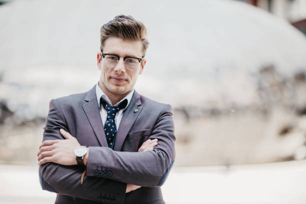 istock Laid-back businessman with crossed arms 690157762