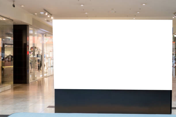 istock Mock up. Blank billboard, advertising stand in modern shopping mall. 690167054
