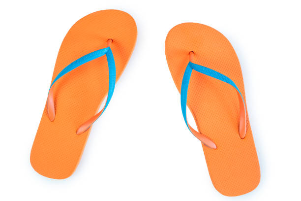 istock Orange Flip Flops Isolated On White Background. Top View 690172954