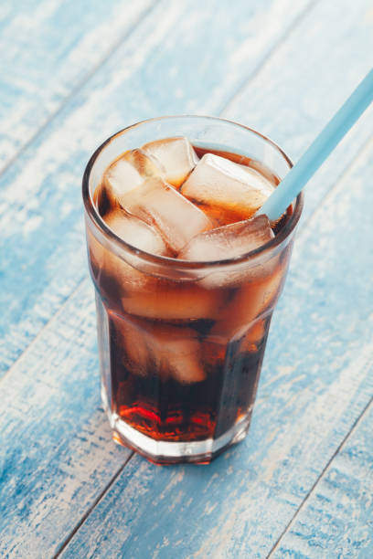 istock Cola soda soft drink top view on white table 690173212