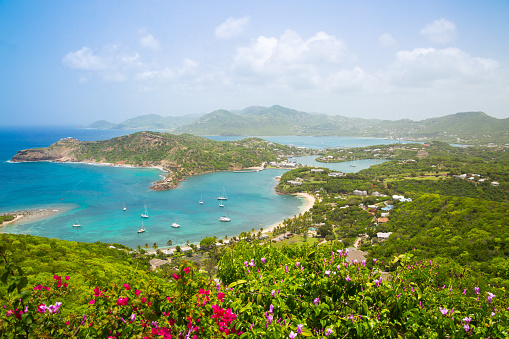 Antigua, English Harbour panoramic view with boats and yachts. View include Freeman bay and beach