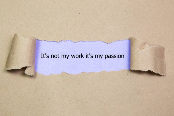 istock The word It's not my work it's my passion appearing behind torn paper. 690177596