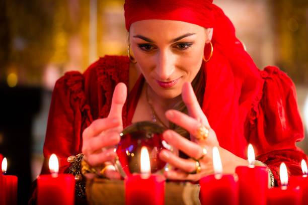 istock Soothsayer during session with Crystal ball 690191968