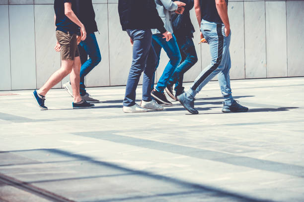 istock Human legs on the street 690198762
