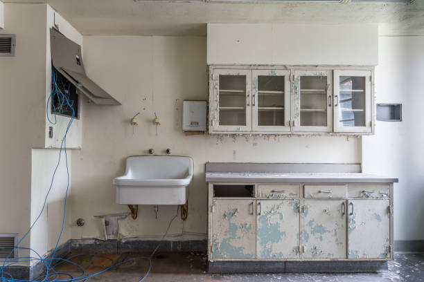 istock Room with sink in an abandoned hospital 2 690203046