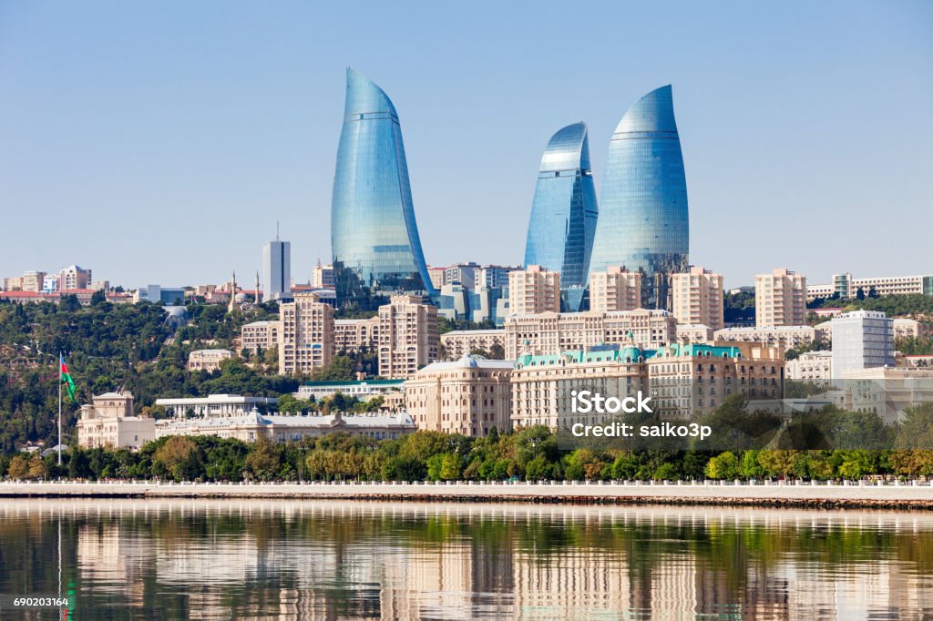 Flame Towers in Baku Baku Flame Towers is the tallest skyscraper in Baku, Azerbaijan with a height of 190 m. The buildings consist of apartments, a hotel and office blocks. Baku Stock Photo