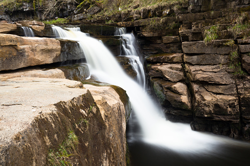 The waterfall is part of a series of waterfalls near the village of Keld, located in the Yorkshire Dales national park