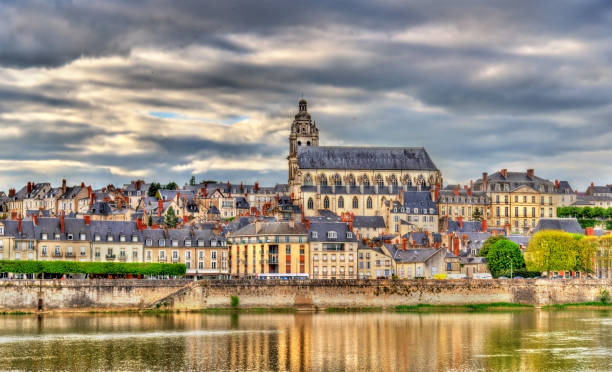 View of the old town of Blois and the Loire river - France View of the old town of Blois and the Loire river - France, Loir-et-Cher blois stock pictures, royalty-free photos & images