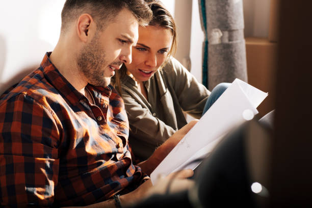 istock Young couple trying to figger out draft 690215086