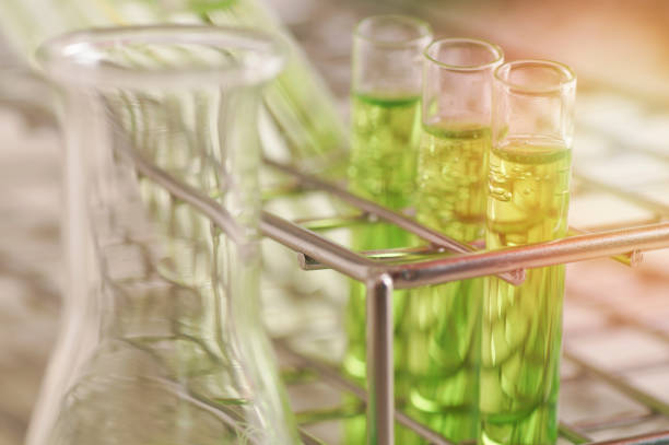 istock scientific experiments,  Laboratory equipment and  test tubes- science concept 690220530