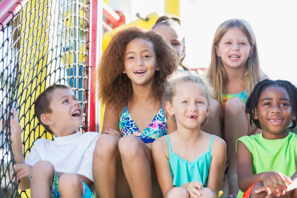 istock Multi-ethnic group of children at water park 690223242