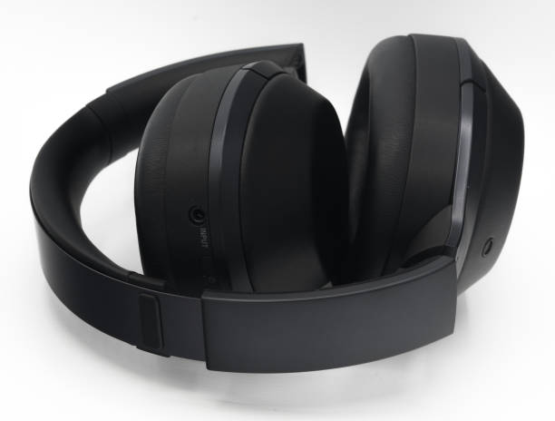 istock Black plastic wireless bluetooth over the ear headphones 690224606