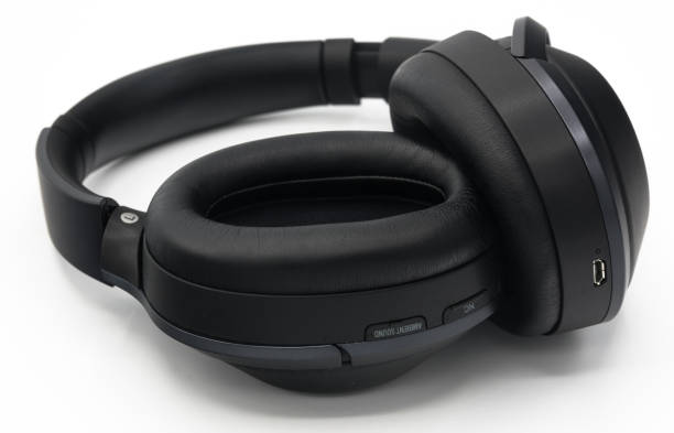 istock Black plastic wireless bluetooth over the ear headphones 690224622