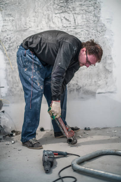 istock 30 years old man, manual worker - plumber, working with pipes for home renovation 690228212