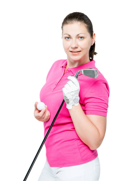 молодая брюнетка любит играть в гольф, позируя на белом фоне - golf women pink ball стоковые фото и изображения