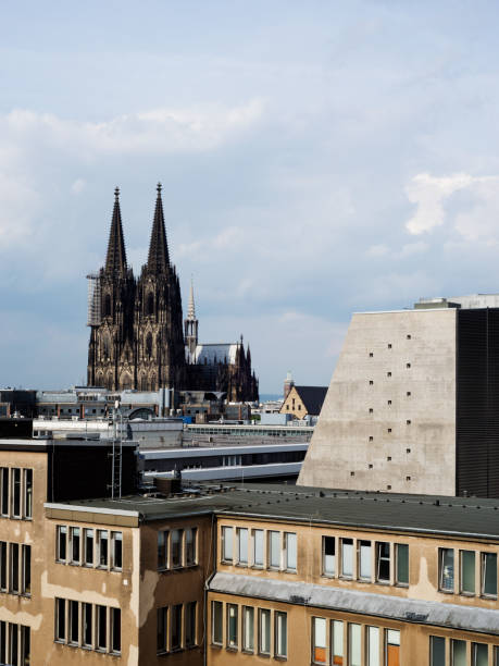 Looking north-east from parking deck in Downtown Cologne across the opera house to Cologne Cathedral. Cologne, Germany. 24/05/2017