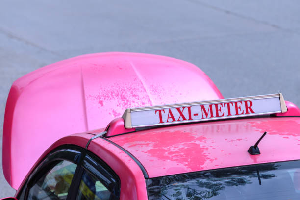 istock Pink taxi has broken on the road. 690229526