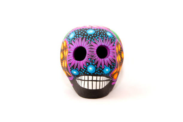 istock Mexican colorful skull in middle of white background 690229832