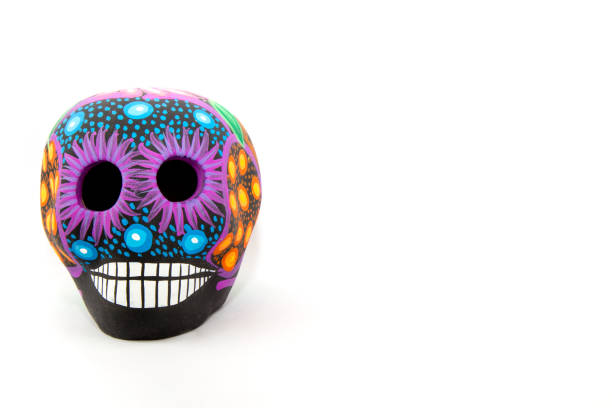 istock Mexican colorful skull with white background 690229866