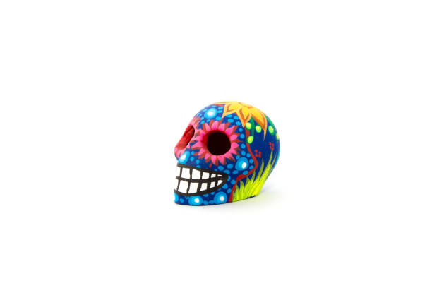 A Mexican blue and neon colors skull, with a white background