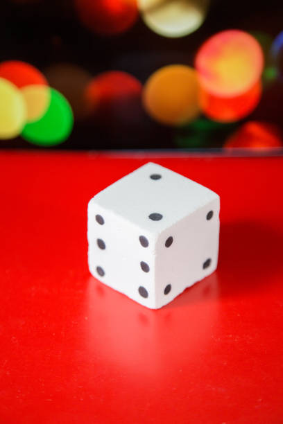 istock salt dice, with colorful bokeh as background 690239164