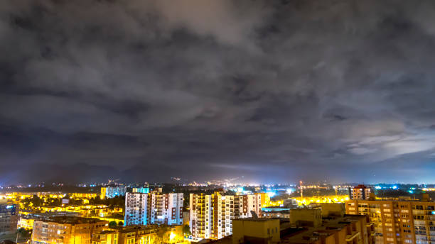 istock Night sky with cloud over a city 690239474