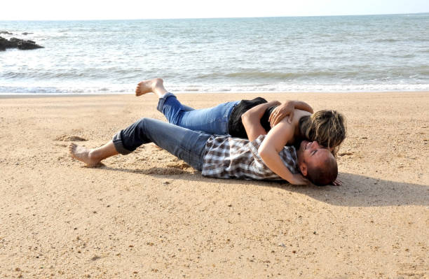 istock Couple dating on the beach 690241068