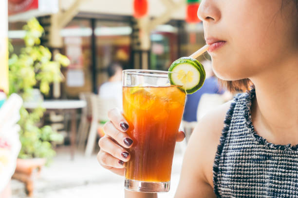 istock Woman enjoying lemonade 690251882