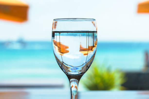 istock Water glass near beach 690251928