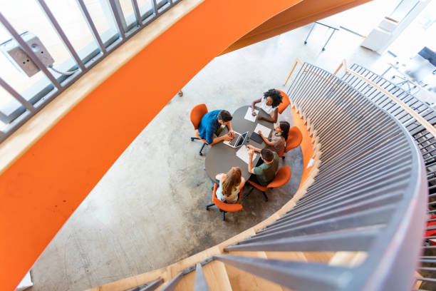 Top Down View of Open Plan Business Meeting