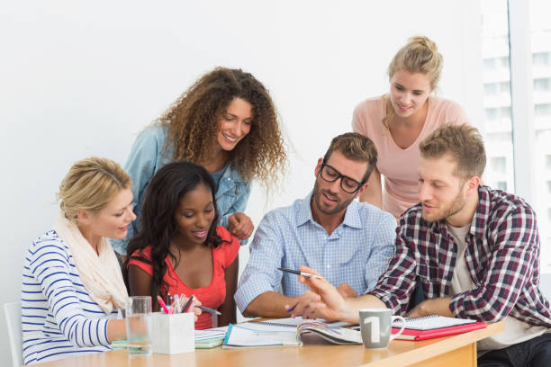istock Team of young designers having a meeting 690259682