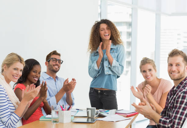 istock Team of designers applauding at the camera 690259734