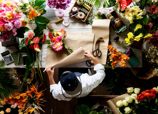 istock Flower shop business owner working service 690259834