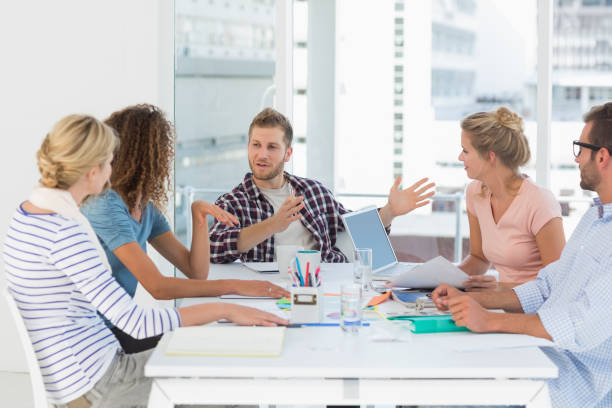 istock Young design team having a meeting together 690259970