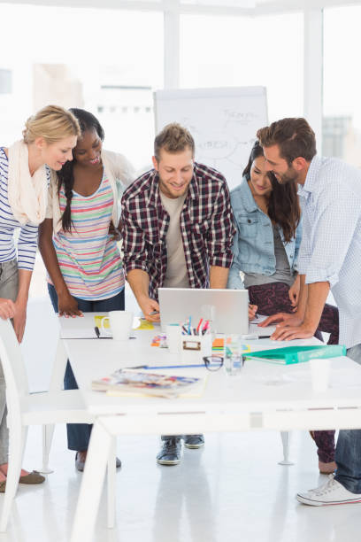 istock Happy team of designers having a meeting 690260130