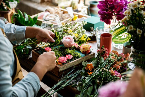 istock Flower shop business owner working service 690262332