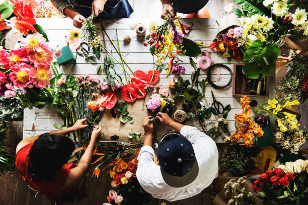 istock Flower shop business owner working service 690262580