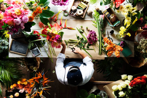 istock Flower shop business owner working service 690262856